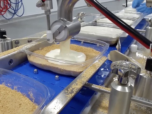Automated production line for cheesecake application