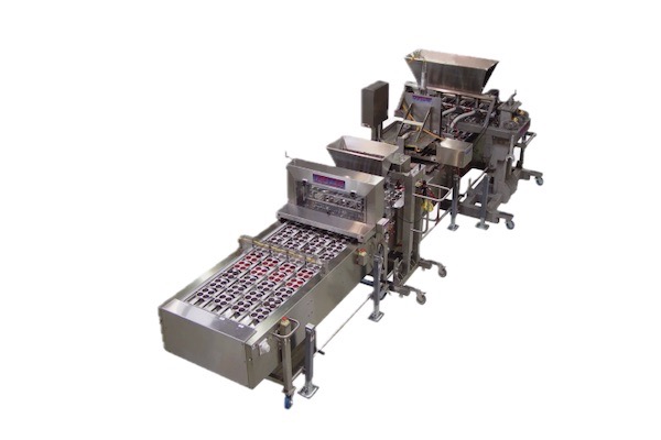 Automated cupcake decoration line 