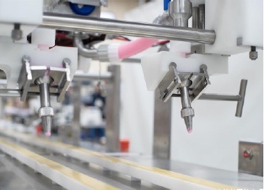 Automated cake decoration for sheet cakes